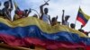 Manifestantes protestan contra los resultados oficiales de las elecciones que declaran la reelección del presidente Nicolás Maduro en Valencia, Venezuela. (AP/Jacinto Oliveros)