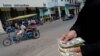 Cuba-dólares-economía. Foto AFP