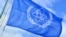 Bandera del Organismo Internacional de Energía Atómica, adscrito a la ONU.