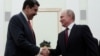 El presidente ruso Vladimir Putin y su homólogo venezolano Nicolás Maduro durante una reunión en el Kremlin en 2019.