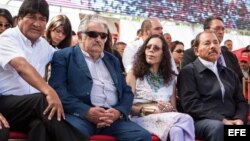 Los mandatarios Evo Morales (Bolivia), José Mujica (Uruguay) y Daniel Ortega (Nicaragua) en un acto en Caracas de apoyo al chavismo.
