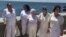 Damas de Blanco en el exilio, en el malecón de la Ermita de la Caridad en Miami.